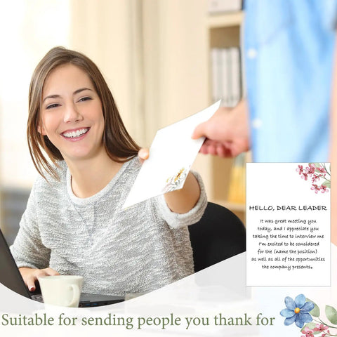 Person handing over a 100 Piece Floral Blank Note Cards Set, 4 by 6 Inches, Bulk Notecards for DIY Projects, School, Office, Wedding