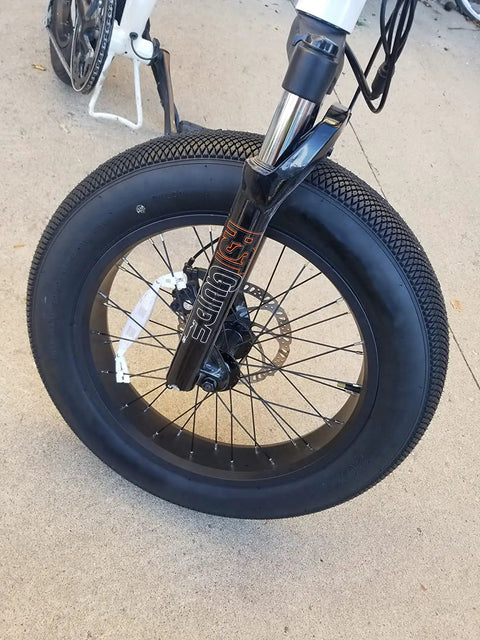 Close-up of Syvrac Aluminum Suspension Fork For 20 Inch Fat Bikes And Snow Mountain Ebikes with 4.0 tire and 60mm travel.