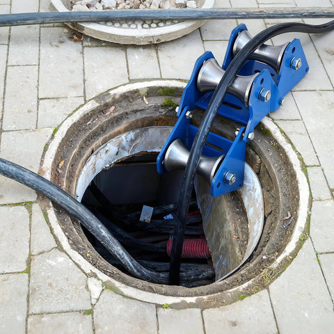 Beefed-Up Industrial Grade Heavy Duty Cable Puller Sheave With 180 Degree Adjustable Angle guiding cables through a manhole