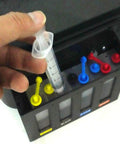 Image of Three Pack 20 Milliliter Plastic Syringes With Slick Blunt Luer Lock Needles For Precision Liquid Transfer in use during ink refilling.