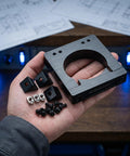 Solid CNC Motor Mounting Bracket For Spindle 65mm Engraving Machine Stand with hardware in hand for machinists.