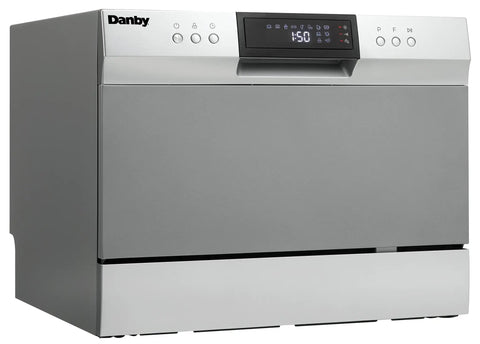 Total Game Changer Compact Countertop Dishwasher In Brushed Stainless Steel with control panel and display.