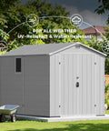 6x10 Ft Plastic Storage Shed With Floor Lockable Door And Windows Waterproof Outdoor Garden Tool Shed For Patio Lawn And Backyard Durable Resin Construction With Large Capacity For Mowers Bikes And Tools in light gray with wheelbarrow nearby, outdoor setting