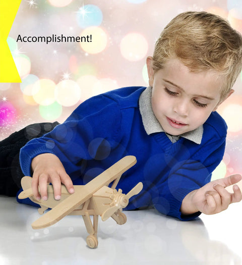 Child playing with Wooden Airplane Model Kit from 4 Pack Water Plane Spirit Of St Louis Nieuport 17 Tri Plane 3D Puzzles Set