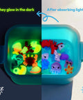Glow In The Dark Water Gel Kit For Kids with sea creature molds glowing and non-glowing in blue container after light exposure.