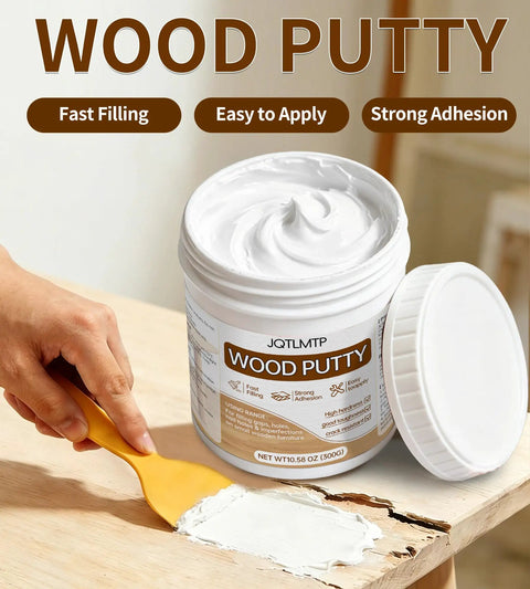 Premium White Wood Filler For Furniture Repair Heavy Duty Blend applied to wood surface with a spatula in a 10.58 oz tub.