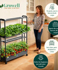 Woman standing by a 60 Pod Vertical Hydroponic Garden System With Smart Full Spectrum Grow Lights And Auto Water Circulation