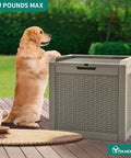 Golden retriever beside 32 Gallon Rattan Deck Box With Lockable Lid And Side Handles on patio