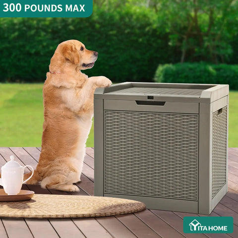 Golden retriever beside 32 Gallon Rattan Deck Box With Lockable Lid And Side Handles on patio