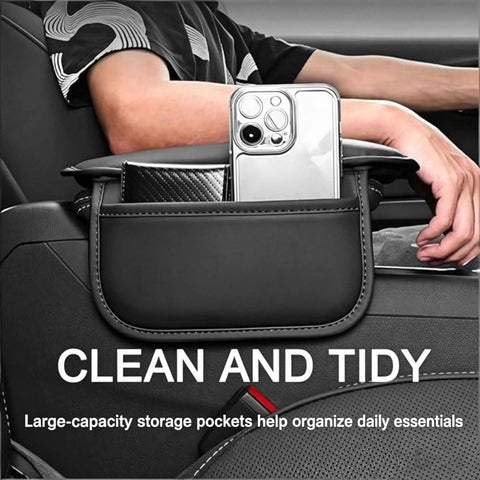 Kickass Double Duty Armrest Pad For Tesla Cybertruck Console With Nailed It Elastic Strap and Ultra Thick High Resilience Foam in use, showing organized storage.