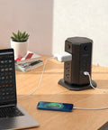 10-Foot Power Strip Tower With Eight Outlets And Five USB Ports, Dope Surge Protector With Individual Switches, 1080 Joules, 13A Circuit Breaker, Flat Plug, Desktop Charging Station For Home Office, Black, on a desk charging devices