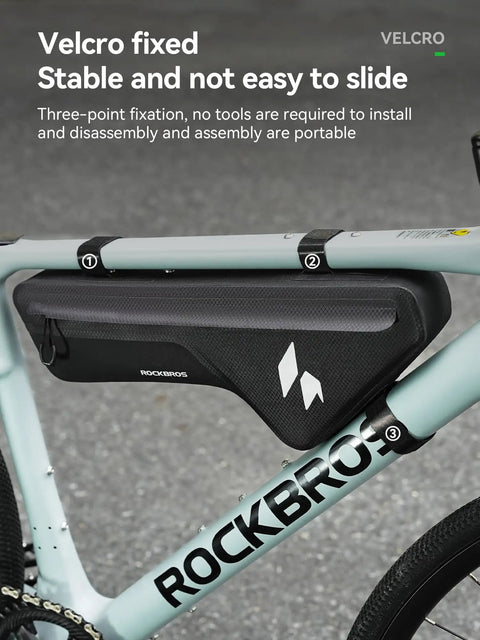 Bike with Waterproof Bike Frame Bag With Seamless One Piece Construction Front Bag With Four Sided PP Reinforcement attached.