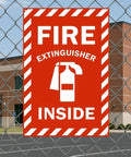 High Visibility Fire Extinguisher Inside Sign 8x12 Inch Metal Safety Plaque on fence outside commercial building
