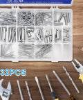 Open box containing 132 Piece Galvanized Steel Clevis Pins Set With 15 Sizes Heavy Duty Assortment Kit For Trailers Tractors Trucks Snow Plows Lawn Mowers Towing Farm Equipment Includes Cotter Pins Hair Pins, with tools on wooden surface.