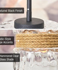 Close-up of Sage 10 Inch Farmhouse Pendant Light with hammered glass, textured black finish, and rope accent