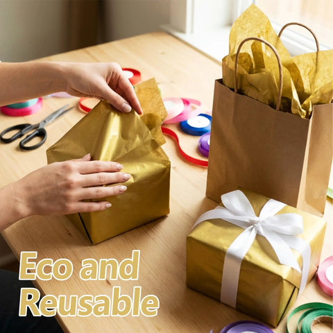 Person wrapping gifts with Gold Metallic Tissue Paper Pack 100 Sheets 14 By 20 Inches For Gift Bags And Wrapping Perfect For Birthdays
