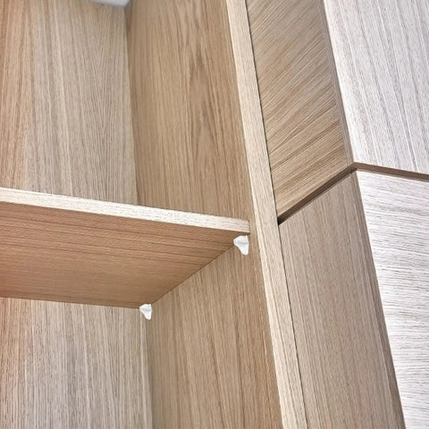 20 Piece Plastic Cabinet Shelf Pegs 3mm Smooth Surface Pins holding a wooden shelf in place