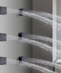 2 Inch Brass Square Massage Shower Body Sprayer Jets in Oil Rubbed Bronze Set of 6 with water sprays visible on gray wall