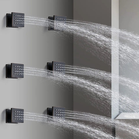 2 Inch Brass Square Massage Shower Body Sprayer Jets in Oil Rubbed Bronze Set of 6 with water sprays visible on gray wall