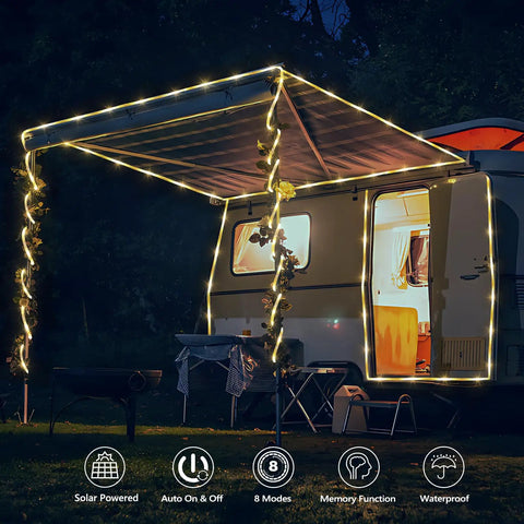 66 Feet Of 200 LED Solar Rope Lights With 8 Modes No Fuss Waterproof Outdoor String Lights In Clear Tube For Garden Patio Deck Backyard Porch Pool Tree Decor Warm White Auto On Off used to illuminate a camper awning at night.