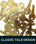 Y11 Brass Key Blanks Uncut Pack Of 50 for home and professional use shown scattered with smooth edges.