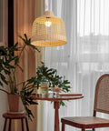 Rattan Pendant Light Hand Woven Basket Shade Ceiling Lamp for Kitchen Island, natural bamboo above dining table and chair.