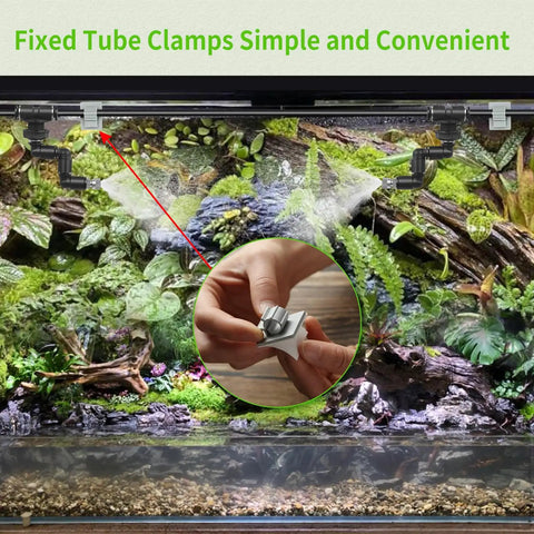 Misting Irrigation Kit For Plants With One Quarter Inch And One Half Inch Tubing, showing fixed tube clamps in greenhouse setup.