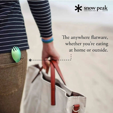 Person holding a bag with Ultra Lightweight Titanium Spork For Outdoors Camping Utensil in pocket.