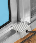 Tough As Nails Aluminum Sliding Window Locks With Tamper Resistant Allen Screw Design And Smooth No Mess Install For Standard Quarter Inch Metal Tracks Keep Ya Kids Safe Included Two Piece Set, close-up of lock installed on metal track.