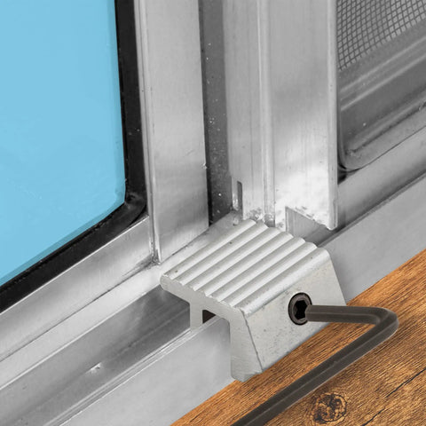Tough As Nails Aluminum Sliding Window Locks With Tamper Resistant Allen Screw Design And Smooth No Mess Install For Standard Quarter Inch Metal Tracks Keep Ya Kids Safe Included Two Piece Set, close-up of lock installed on metal track.
