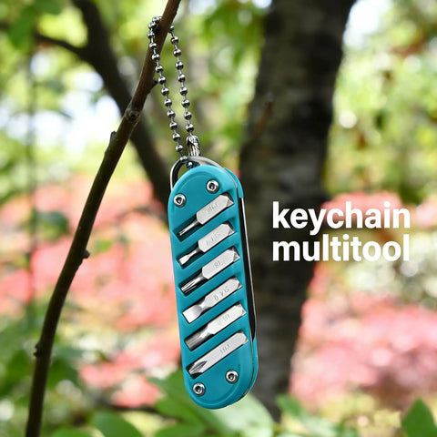 7-In-1 EDC Pocket Knife Multitool for Keychain Quick Fixes, Outdoor Gear, and Daily Tasks, Blue, hanging on tree
