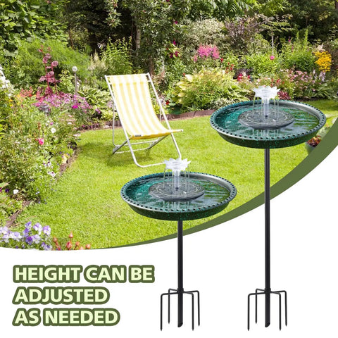 Solar Powered Bird Bath Fountain With Lotus Flower Nozzle And Five Prong Stake Base in garden setting