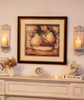 Rustic Whitewashed Wood Candle Sconces Wall Decor Set Of Two with pillar candles and framed art on a mantel.