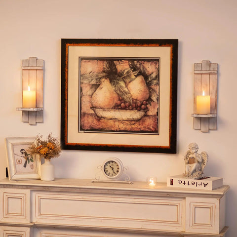 Rustic Whitewashed Wood Candle Sconces Wall Decor Set Of Two with pillar candles and framed art on a mantel.