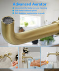 Close-up of brushed gold wall mount bathroom faucet spout with vintage widespread design and dual round handles for vessel sinks.