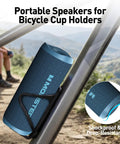 Beast 60W Portable Outdoor Bluetooth Speaker With True Wireless Stereo in bike cup holder, rugged blue, IPX8 waterproof.