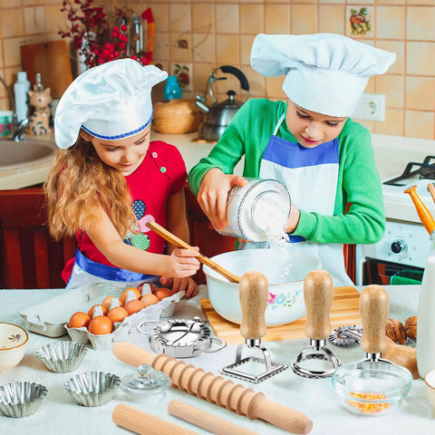 Children using 9 Piece Gnocchi And Pasta Making Set With Gnocchi Board, Pasta Cutter, Ravioli Stamp, Rolling Pin, Dumpling Makers