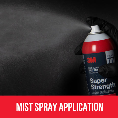 Hand spraying multi surface spray adhesive for light duty materials with fast dry time and low VOC, clear finish, on dark surface.