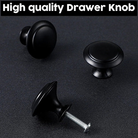 100 Count Matte Black Round Cabinet Knobs 1.18 Inch Drawer Knobs For Dresser Drawers Cabinet Doors And Kitchen Hardware Includes 100 Screws For Easy Mounting featuring screws for easy installation on a dark surface.