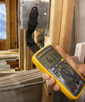Hands Free Multimeter Hanging Kit With Magnetic Hanger And Two Straps Plus Two Clips For Electrical Meters in use on metal surface