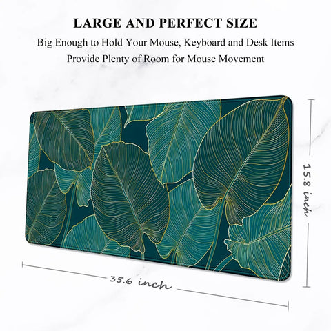 Ultra Large Green Tropical Leaves Desk Pad For Keyboard, Laptop And Computer, XXL Gaming Mouse Pad, Extra Big Full Size Mouse Mat, 35.5 By 15.7 Inches, Desk Setup Game Ready For Work And Gaming with tropical leaf design.
