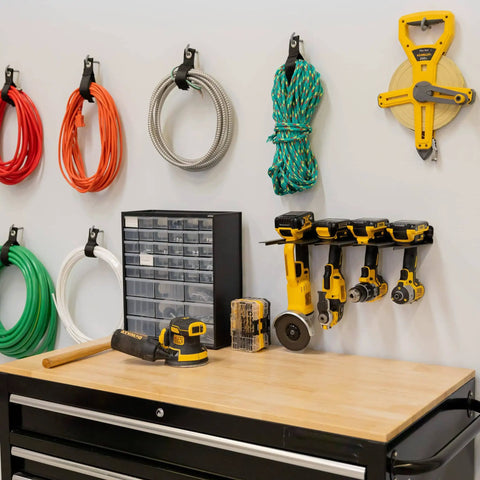 Garage wall with Wall Mounted Drill Storage Rack For Four Drills Holds Up To 35 Lbs Heavy Duty Steel With Powder Coated Finish