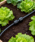 Complete 45 Piece Quick Connect Drip Irrigation Fittings Kit For One Quarter Inch Tubing in a vegetable garden.