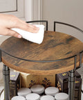 Hand cleaning the top of Smooth Spin Two Tier Lazy Susan Spice Rack Organizer With Adjustable Height For Kitchen Counter.