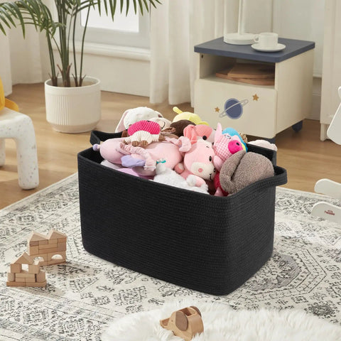 95L Extra Large Blanket Basket For Living Room And Nursery 24 By 16.9 By 14.2 Inch Woven Storage Bin Perfect For Blankets Toys Towels And Dirty Clothes Sturdy Rectangle Organizer In Black filled with stuffed animals