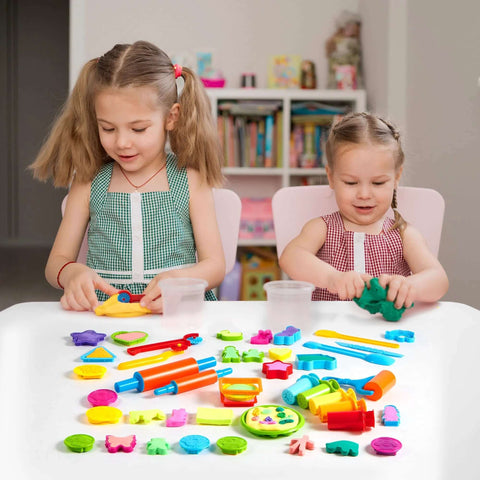Front view of two kids at a table playing with JOYIN 44-piece clay tools set; colorful molds and rolling pins