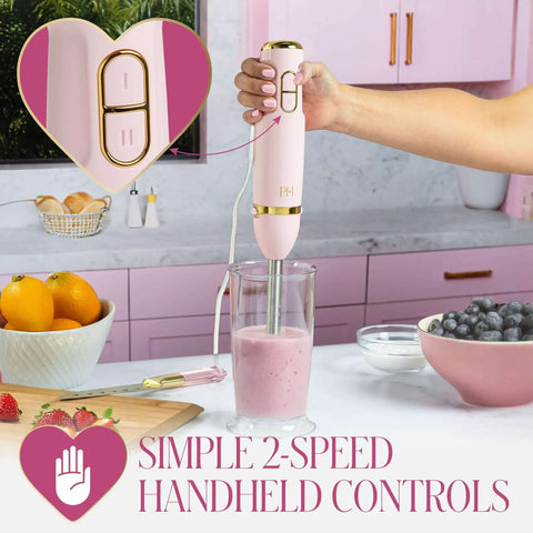 Chic Pink And Gold 3 In 1 Immersion Blender With Whisk And Chopping Bowl 400W High Speed Handheld Mixer in use blending smoothies.