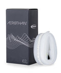 Aerothan Tube Ultra Lightweight TPU Bicycle Inner Tube For MTB Mountain Bikes Trekking Gravel Cargo And BMX Heat Resistant Pro Grade Low Rolling Resistance Rim Brake Ready Made In Germany next to package box showing weight 62g
