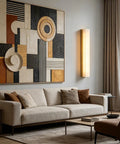 Modern Linear Alabaster Wall Sconce Featuring Polished Copper Base And Three Switchable Color Modes For Chill Bedroom And Living Room Super Sleek Bar Lamp Fixture above a beige couch and wall art.