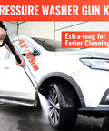 Pressure washer gun wand with swivel and ergonomic handle, 43-inch black extension, spraying a car.